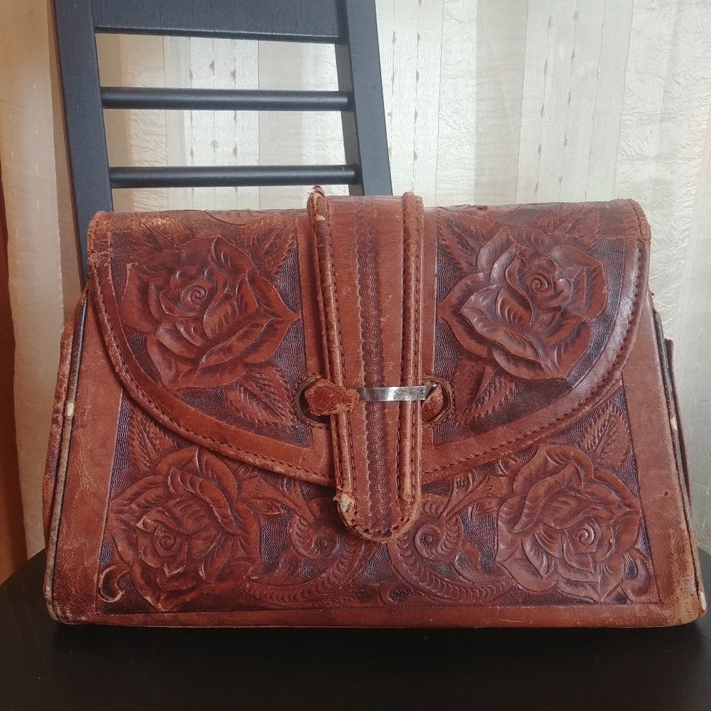 Vintage brown leather tooled clutch